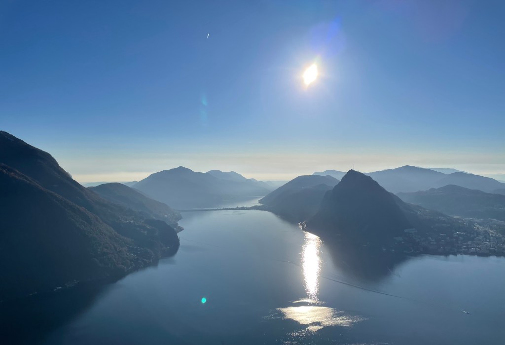 Sun over the Bay of Lugano & Monte Brè in Switzerland